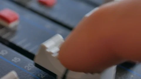 Sound engineer, DJ is adjusting the volume of the sound. Stock Footage 108629187