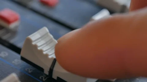 Sound engineer, DJ is adjusting the volume of the sound. Video stock 108629190