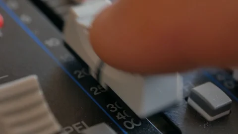 Sound engineer, DJ is adjusting the volume of the sound. Stock Footage 108629198