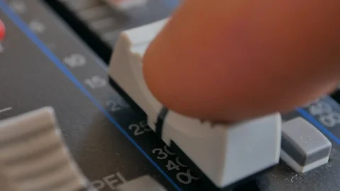 Sound engineer, DJ is adjusting the volume of the sound. Stock Footage 108629230