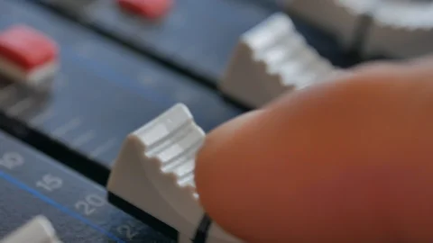 Sound engineer, DJ is adjusting the volume of the sound. Video stock 108629252