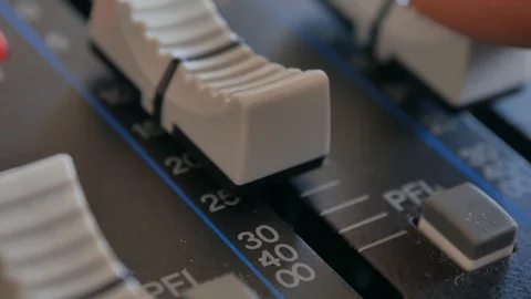 Sound engineer, DJ is adjusting the volume of the sound. Stock Footage 108629256