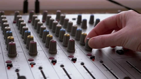 Sound Engineer, DJ Moves Sliders with Fingers on Audio Mixer in Recording Studio Stock Footage 150114922