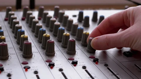 Sound Engineer, DJ Moves Sliders with Fingers on Audio Mixer in Recording Studio Stock Footage 150221552