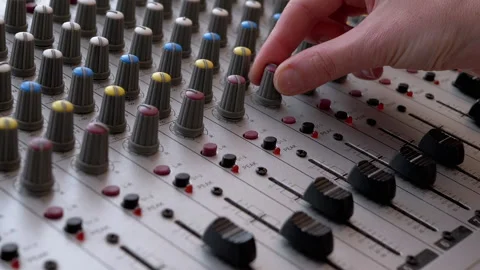 Sound Engineer, DJ Moves Sliders with Fingers on Audio Mixer in Recording Studio Stock Footage 150223891