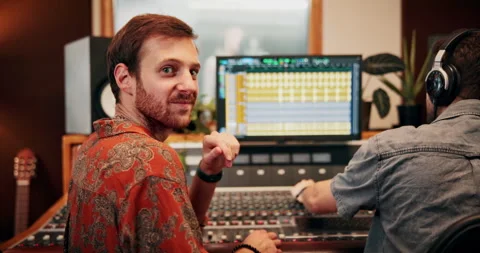 Sound engineer, face and man in control room for music, entertainment or editing Stock Footage 332322994