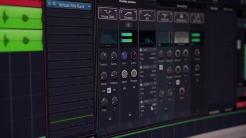 Sound engineer handles voice or writes music using computer plug-ins. Recording Stock-Footage 112164671