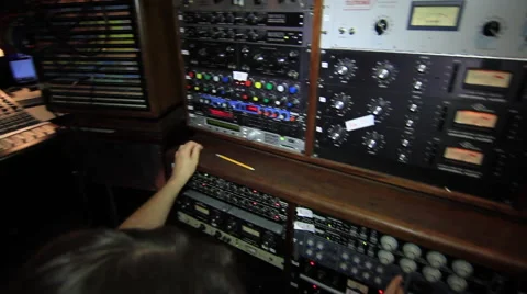 Sound Engineer Mixing pan to drummer in studio Video stock 52686292