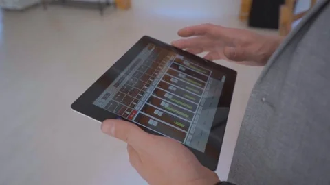 Sound engineer monitors the power level of musical instruments  Stock Footage 103470013