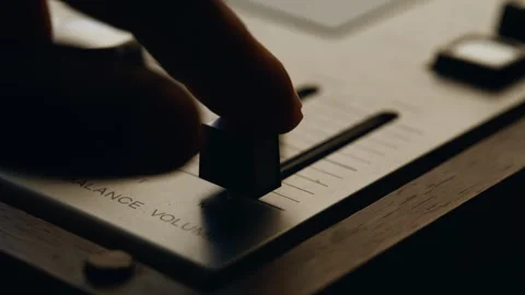 Sound engineer pushing sliders on vintage sound recording device closeup. Stock Footage 332617331