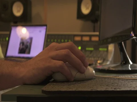 Sound Engineer in Recording Studio Using Computer, Mouse Close Up Stock Footage 74657083