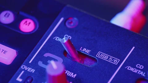 Sound engineer switches toggle switch on mixing console, closeup. Dj turns on Stock Footage 168230580