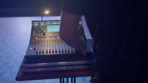 Sound engineer use sound controller stage touches equalizer knobs controls sound 스톡 동영상 196187907