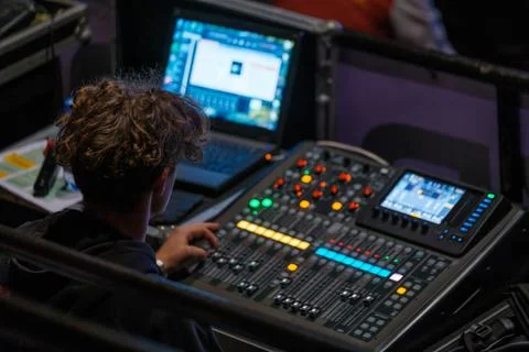 Sound engineer using laptop during work Stock Photos
