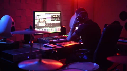Sound engineer working and mixing music indoors in the studio Video stock 304431731