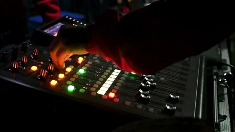 Sound engineer working with Audio mixer board. Sound mixing console Stock Footage 281006491