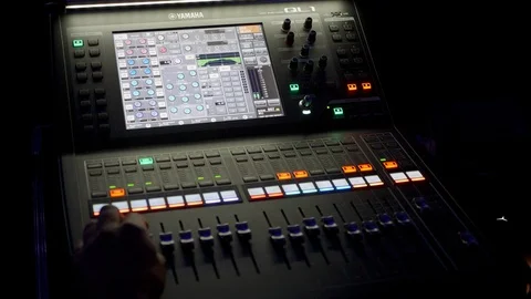 Sound engineer working on desk at live event Stock Footage 106499527