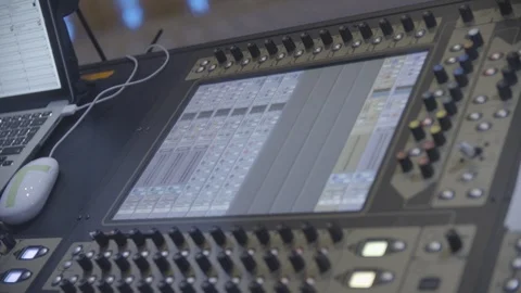 Sound engineer working on mixing desk Stock Footage 98766927