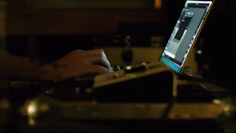 Sound engineer working at mixing panel in the recording studio Stock Footage 108899565