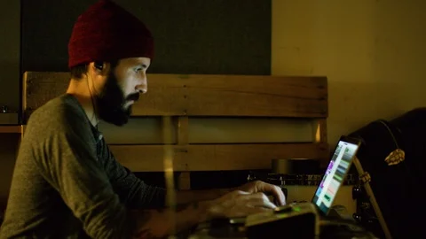 Sound engineer working at mixing panel in the recording studio Stock Footage 109266952