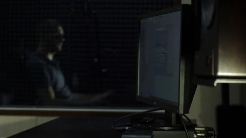 The sound engineer working in the recording studio. Stock Footage 89197325