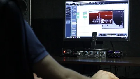 The sound engineer working in the recording studio. Stock Footage 89197764