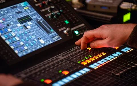 Sound engineer working in recording studio Stock Photos