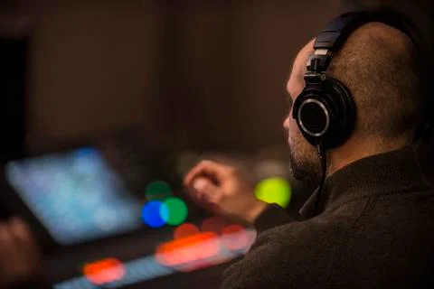 Sound engineer working in recording studio Stock Photos