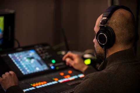 Sound engineer working in recording studio Stock Photos