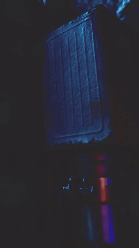 Sound equipment setup in a dimly lit music studio during evening hours Video stock 331440774
