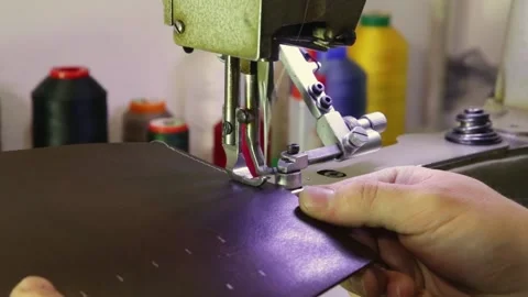 The sound of a machine sewing a leather Stock Footage 154361009