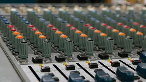 Sound mixer with continuous colored adjustment buttons Stock Photos
