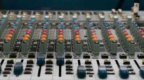 Sound mixer with continuous colored adjustment buttons Stock Photos