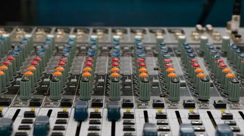 Sound mixer with continuous colored adjustment buttons Stock Photos