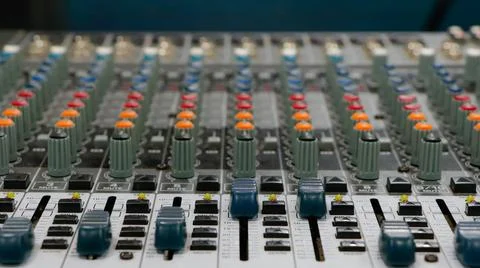 Sound mixer with continuous colored adjustment buttons Stock Photos