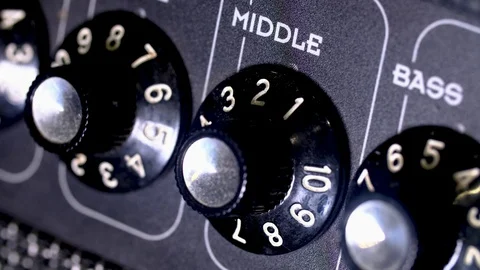 Sound mixer in the studio, automatic knobs on the remote left to right. 库存影片 118929739