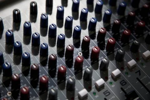 A sound mixing board, close-up, full frame Stock Photos