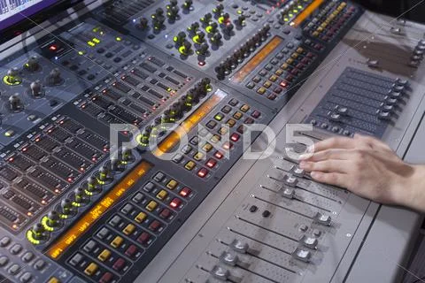 Sound Studio Adjusting Record Equipment.