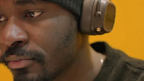 Sound technician concentrates on final audio mixing. Audio engineer attentively Stock Footage 335307871