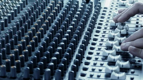 Sound technician hands working on audio mixer Stock Footage 87290670