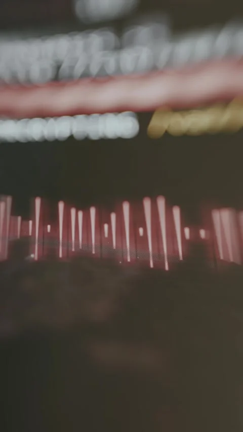 Sound wave visualizer with glowing vertical red lines Stock Footage 335457919