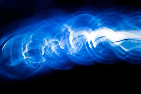 Sound waves in the dark in blue color Stock Photos