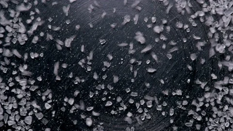 Sound waves move particles of salt, which randomly begin to move on the surface Stock Footage 119072619