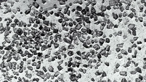 Sound waves move particles of salt, which randomly begin to move on the surface Video stock 119073966