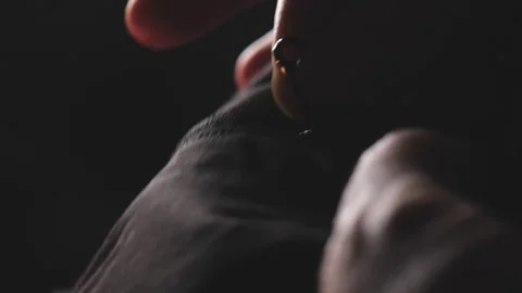 The sound of a zipper on a jacket. man's hand fastens a zipper Stock Footage 273334898