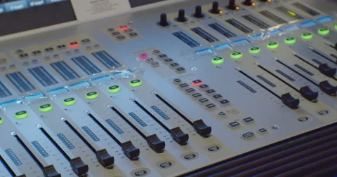 Soundboard with knobs and equalizer. View on audio waves or music control levels Video stock 162071669