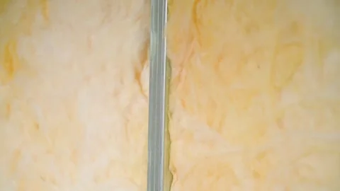 Soundproofing glass wool light frame walls between rooms. Construction, smooth Stock Footage 240601206