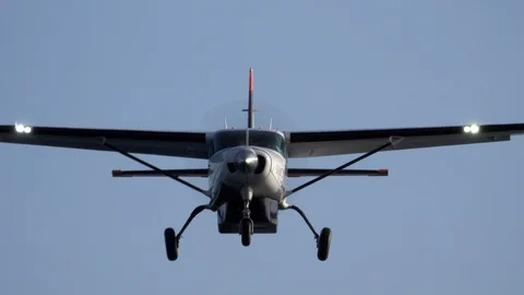 Sounds Air single engined turboprop Cessna landing in strong side wind Stock Footage 121066449