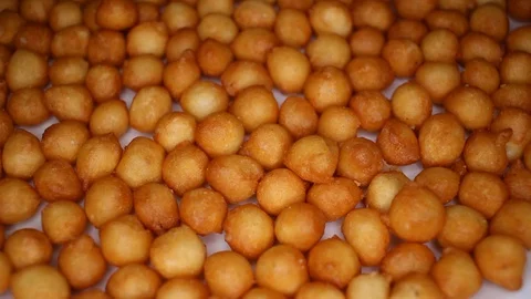 Soup balls closeup texture video on rolling rotating looping plate Video stock 104331820