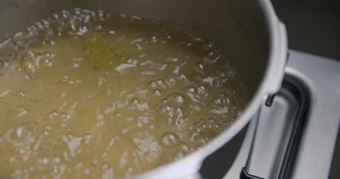 Soup boiling slow motion Stock Footage 85900356